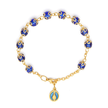 Gold-tone Bracelet with Small Blue Crystal Beads and Filigree Bead Caps