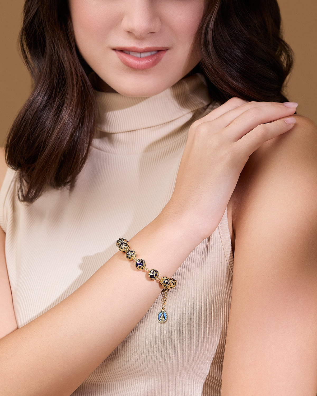 Gold-tone Rosary Bracelet with Blue Crystal Beads and Bead Caps