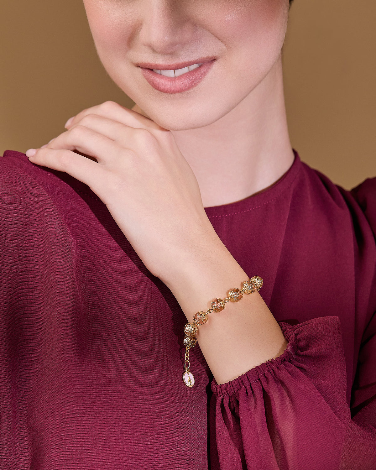 Gold-tone Rosary Bracelet with Pink Crystal Beads and Filigree Bead Caps