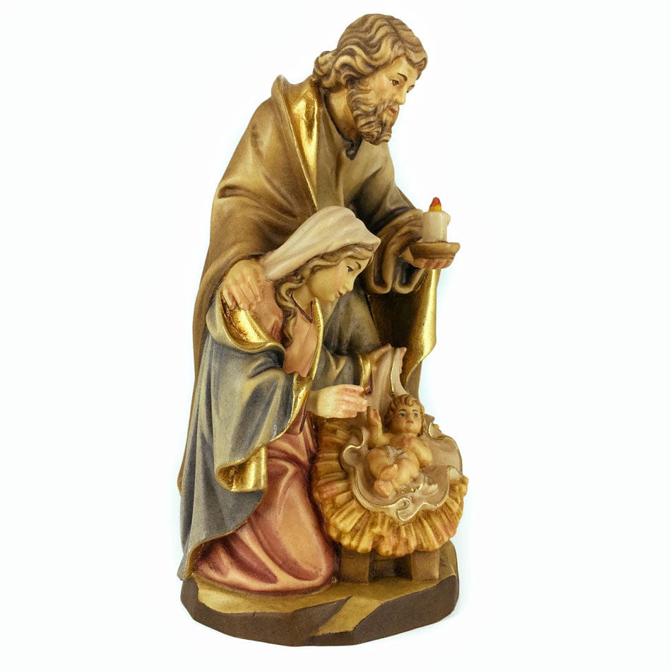Wooden Statue of the Nativity With St. Joseph Holding a Candle