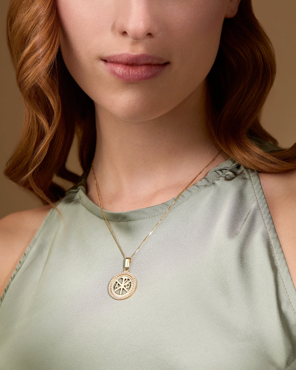 Yellow gold Peace Cross medal with zirconia crystal frame