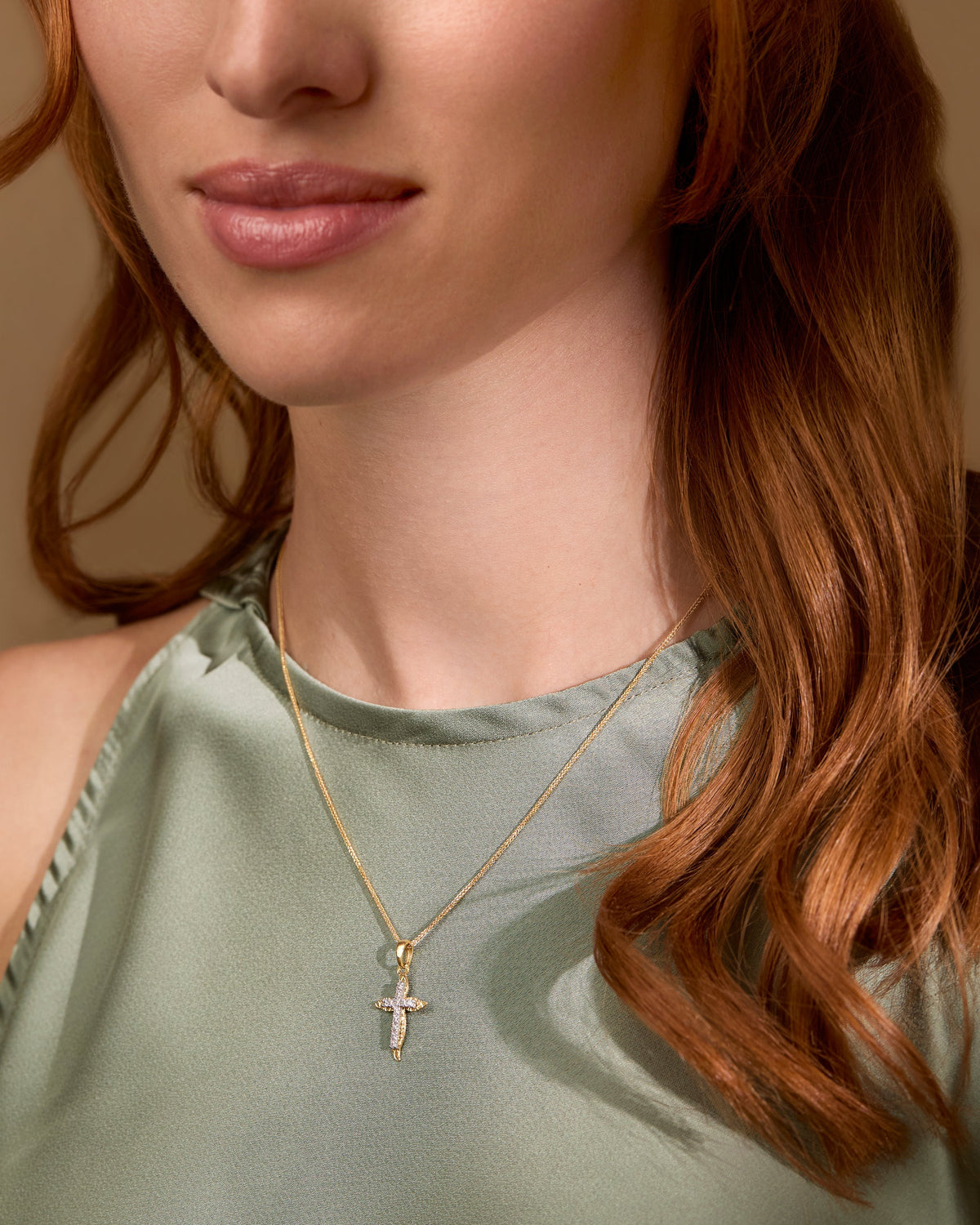 Yellow Gold Wavy Cross Pendant With White Gold Center and Cubic Zirconia