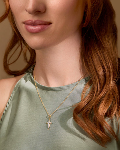 Yellow Gold Wavy Cross Pendant With White Gold Center and Cubic Zirconia